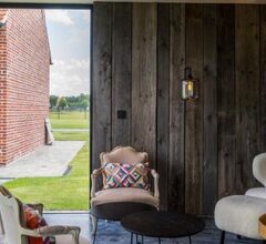 Beautiful reclaimed timber in black oil finish to Garden House